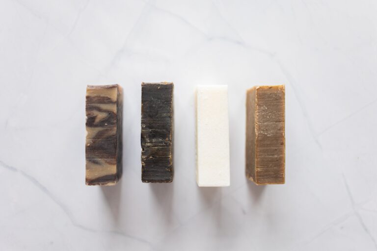 Four organic soap bars lined up